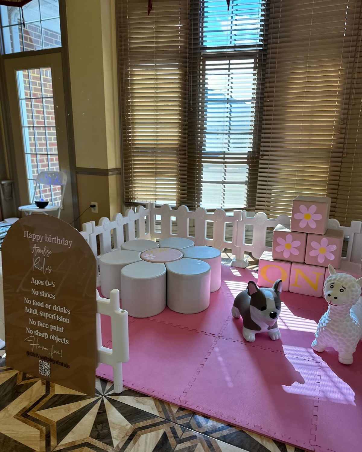 Pink Soft Play Area with Animal Toys and Flower Table for Indoor Toddler Birthday Party and Playroom