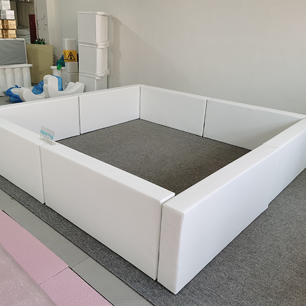 white soft play fence for toddler play area