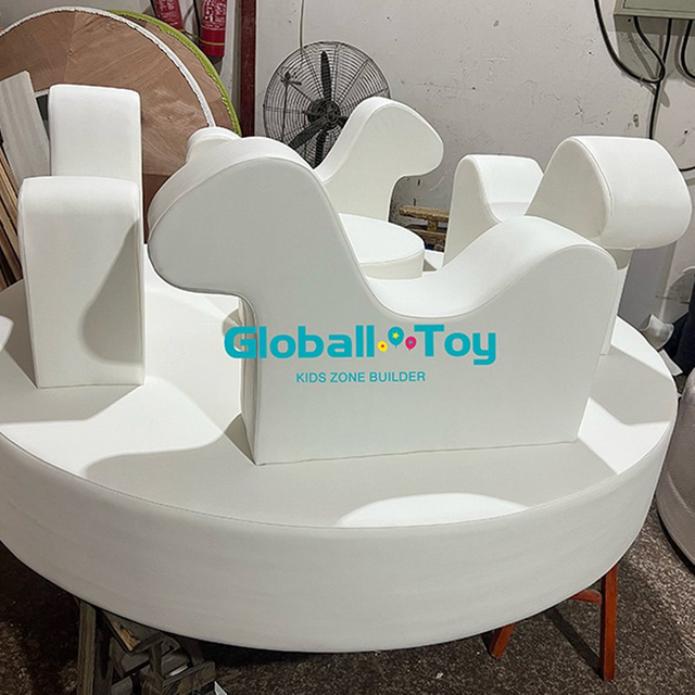 White soft play carousel for indoor kids play area setup