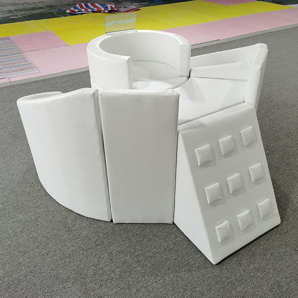 Soft foam climbing structure with white ball pit