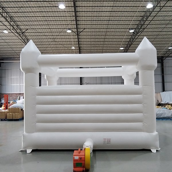 White jumping house with mesh roof for backyard activities