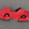 Red soft car rocker with black handle for toddler playgrounds