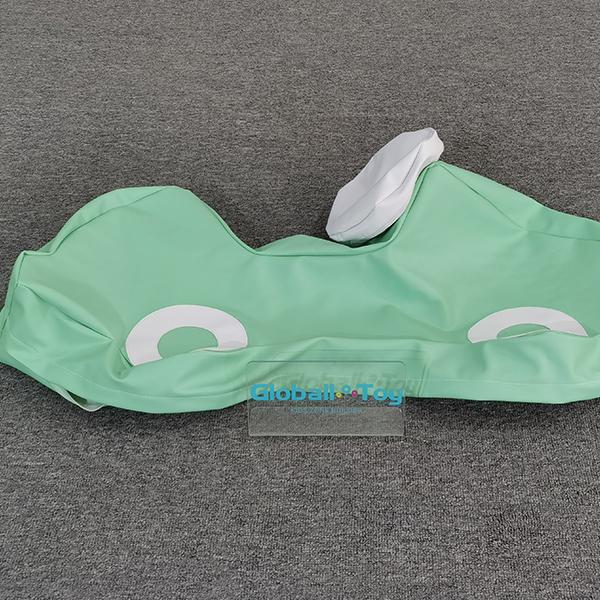 Green car-themed soft rocker with white handle for kids