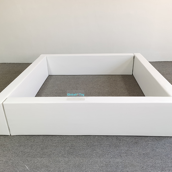Foam-padded white play fence for kids playroom