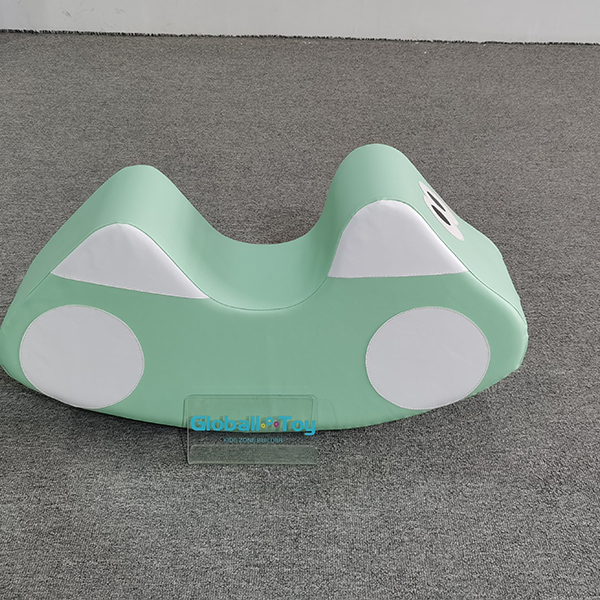Green foam car rocker seat for toddlers