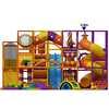 large multi level indoor play structure with spiral slides and tunnels