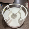 White indoor soft play roundabout toy for toddlers.