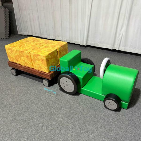 Soft play tractor with yellow foam blocks