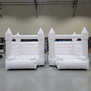 Side-by-side white bounce houses for commercial hire