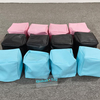 Colorful soft play cubes in pink black and blue 