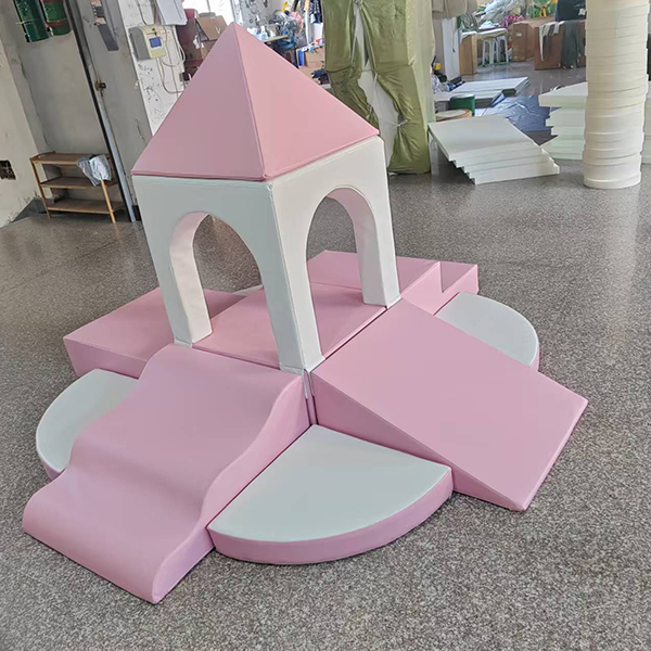 pink soft play castle with slide and ramp