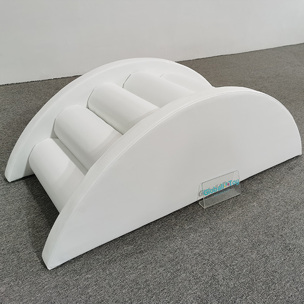 White soft foam arch rocker for toddler play