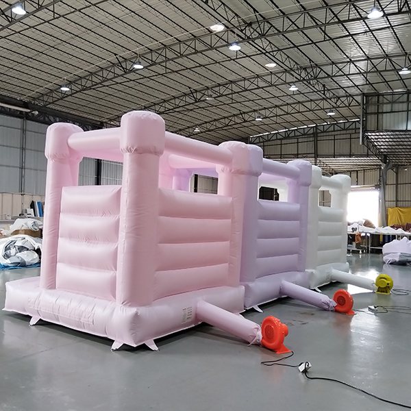 Indoor pastel bounce castle for baby party event