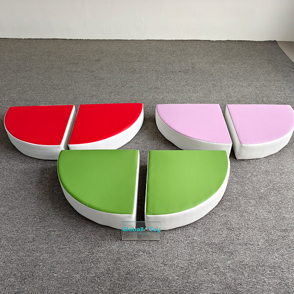 Colorful semi-circle soft blocks in red, green, and pink for kids play