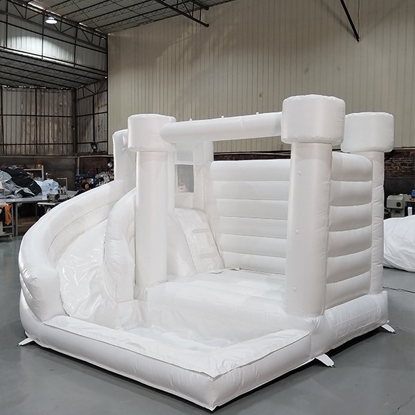 Commercial white bouncy castle with dual slide for events