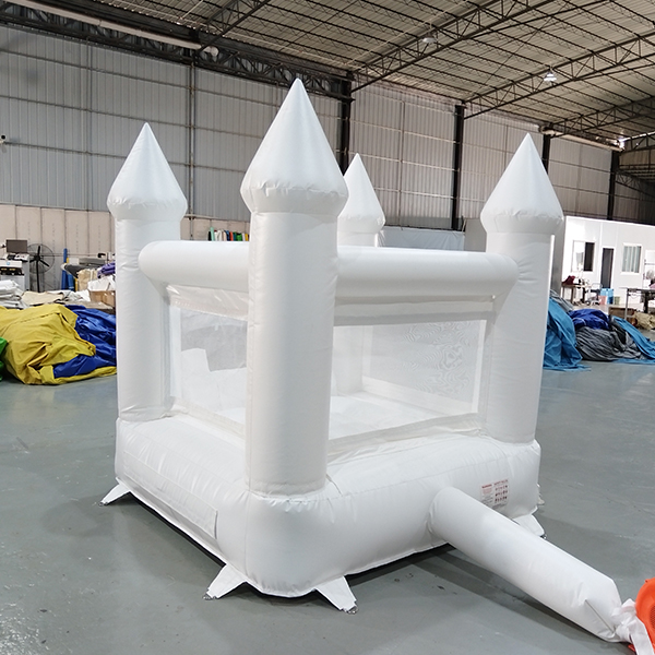 White inflatable castle jumper with slide for birthday party hire