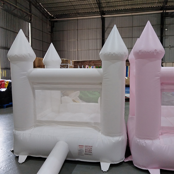pastel color inflatable bouncer with soft slide