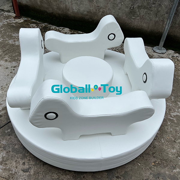 White soft play merry go round ride for toddlers indoor playground