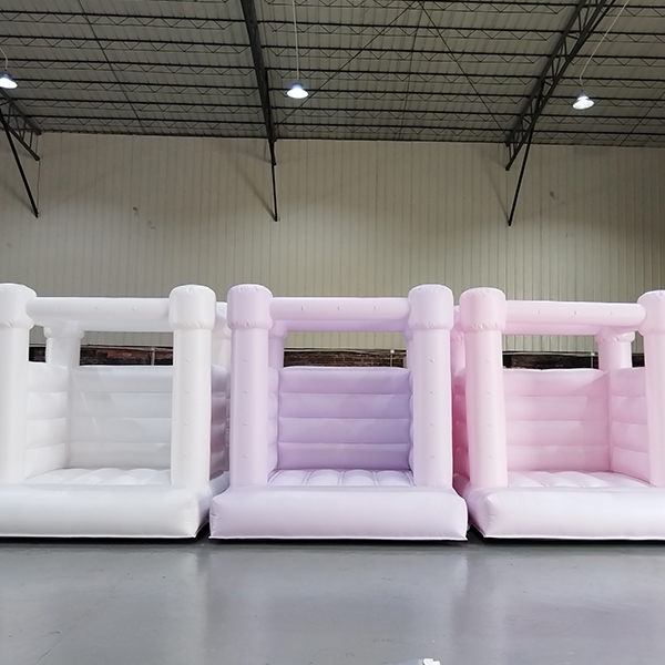 White soft inflatable castle with air blower