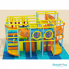 commercial indoor playground with spiral tube slide and climbing obstacles