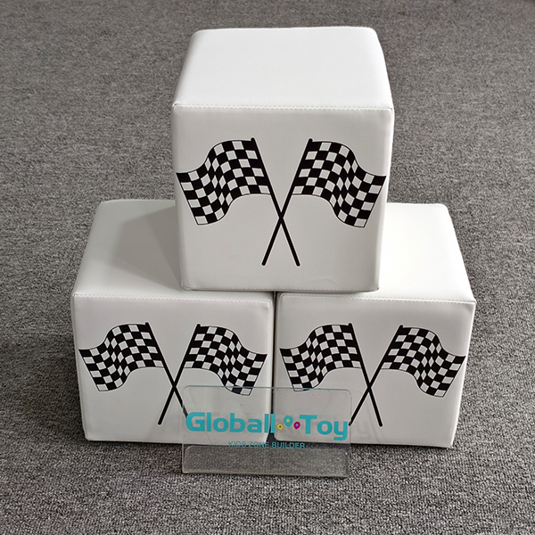 White soft blocks with racing flag pattern for themed play areas