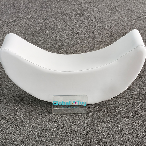 White moon-shaped soft play rocker seat