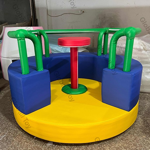Padded spinning seat for toddler indoor activity centers
