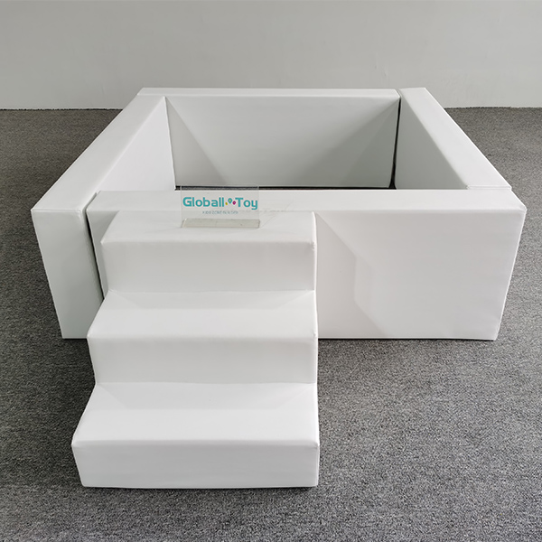 White soft play ball pit for toddlers with steps