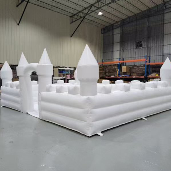 Commercial grade bounce house with slide and mesh safety walls