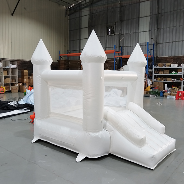 White inflatable bounce house with slide for kids party entertainment