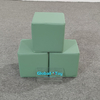 Green soft foam cubes for children’s play area 