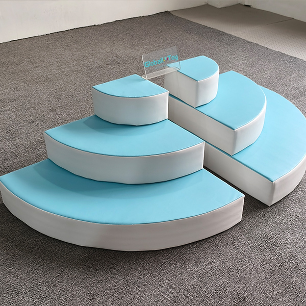 Light blue and white curved foam play steps for baby gym equipment