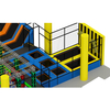 large indoor trampoline playground with basketball hoops and adventure area