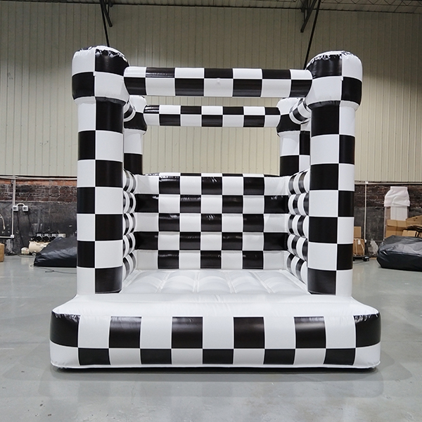 Inflatable checkered bounce structure for garden play rental