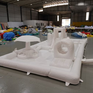 White inflatable obstacle castle with slide and tunnel