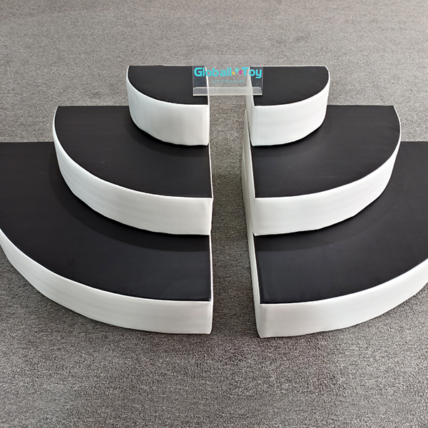 Soft play tunnel in rainbow design for sensory gyms