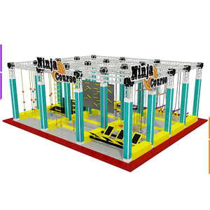 yellow and blue ninja warrior obstacle park with warped wall and rope course