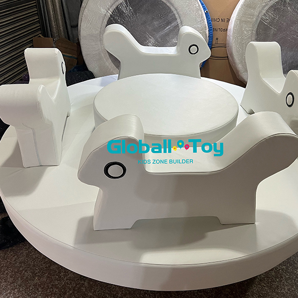 White animal shape soft play merry go round with round platform for indoor playgrounds