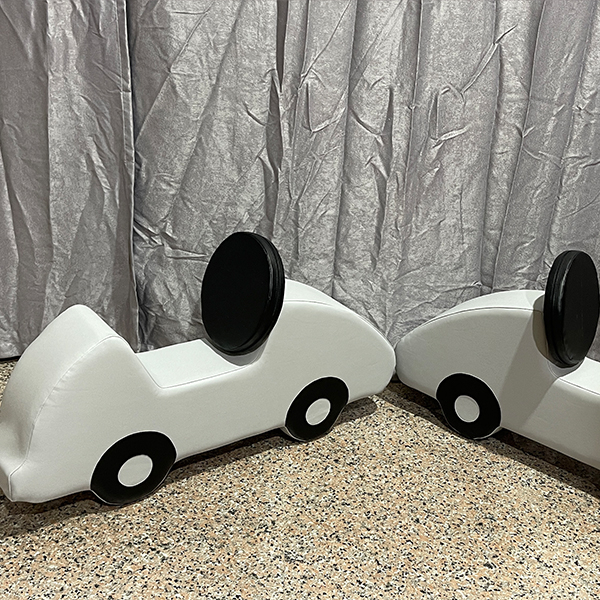 Beige and white foam tunnel climber for toddlers