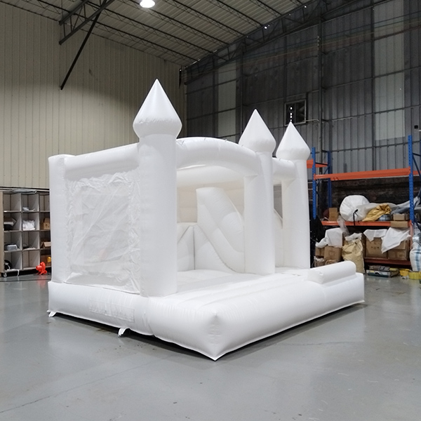 pure white inflatable bouncer castle with mesh sides for parties