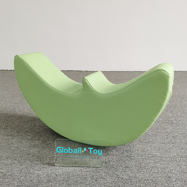 Green foam wobble rocker toy for preschool zone