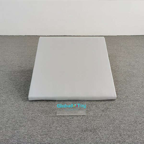 Gray climbing ramp cushion for indoor play area