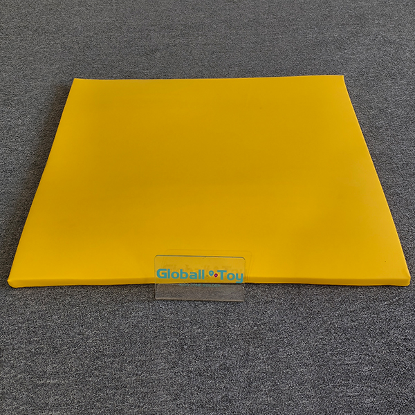 Bright yellow soft foam mat for toddler indoor crawling area